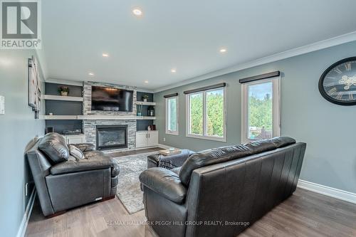 26 Riverside Drive, Mono, ON - Indoor Photo Showing Living Room With Fireplace