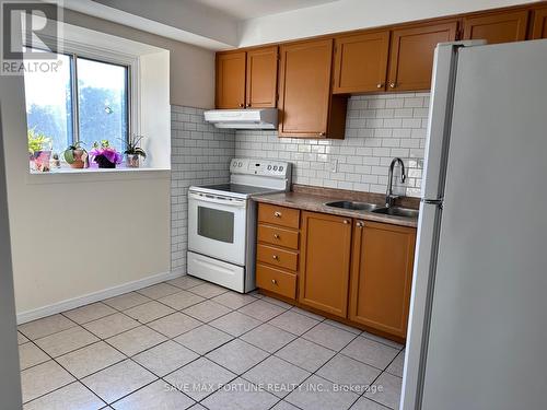 6 - 6 Moregate Crescent W, Brampton, ON - Indoor Photo Showing Kitchen With Double Sink