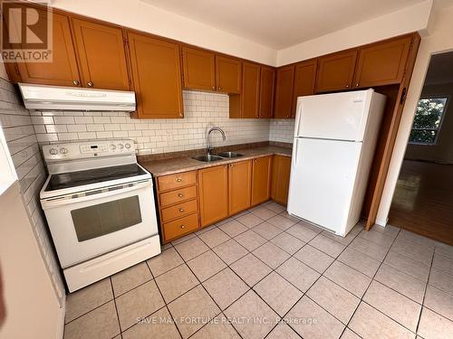 6 - 6 Moregate Crescent W, Brampton, ON - Indoor Photo Showing Kitchen With Double Sink