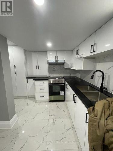 Bsmt - 33 Stedford Crescent, Brampton, ON - Indoor Photo Showing Kitchen With Double Sink