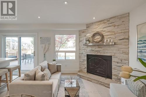 2984 Gulfstream Way, Mississauga, ON - Indoor Photo Showing Living Room With Fireplace