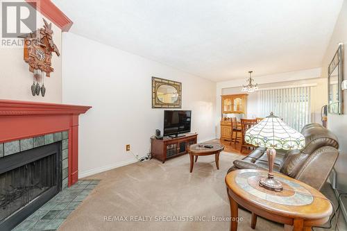 6017 Chidham Crescent, Mississauga, ON - Indoor Photo Showing Living Room With Fireplace