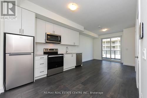 1112 - 3220 William Coltson Avenue, Oakville, ON - Indoor Photo Showing Kitchen