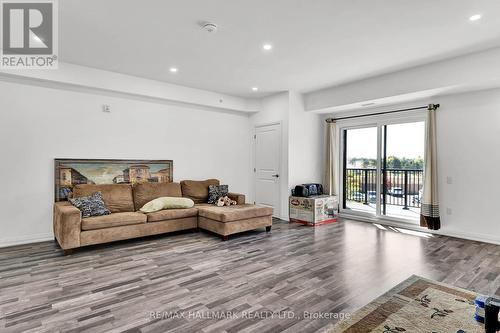 201 - 54 Koda Street, Barrie, ON - Indoor Photo Showing Living Room