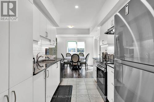 201 - 54 Koda Street, Barrie, ON - Indoor Photo Showing Kitchen With Upgraded Kitchen