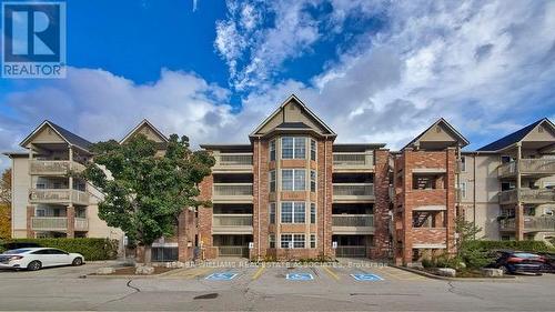 407 - 4013 Kilmer Drive, Burlington, ON - Outdoor With Balcony With Facade