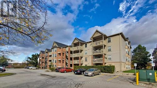 407 - 4013 Kilmer Drive, Burlington, ON - Outdoor With Balcony With Facade