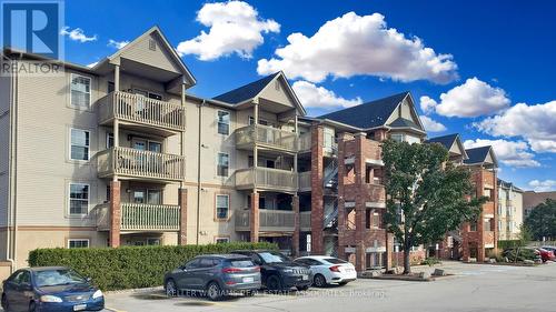 407 - 4013 Kilmer Drive, Burlington, ON - Outdoor With Balcony With Facade