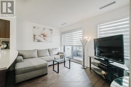 103 - 40 Via Rosedale, Brampton, ON - Indoor Photo Showing Living Room