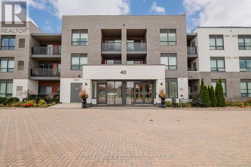 103 - 40 Via Rosedale, Brampton, ON - Outdoor With Facade