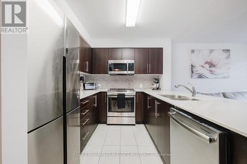 103 - 40 Via Rosedale, Brampton, ON - Indoor Photo Showing Kitchen With Stainless Steel Kitchen With Double Sink With Upgraded Kitchen