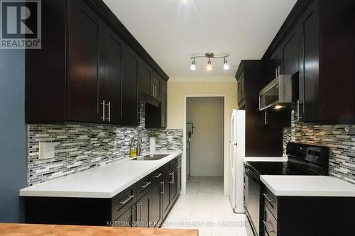 336 - 3055 Tomken Road, Mississauga, ON - Indoor Photo Showing Kitchen With Upgraded Kitchen