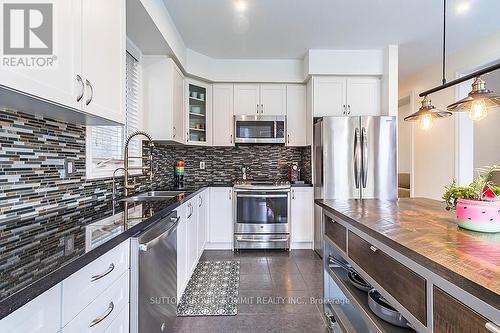 31 Mcdonald Crescent, Clarington, ON - Indoor Photo Showing Kitchen With Double Sink With Upgraded Kitchen