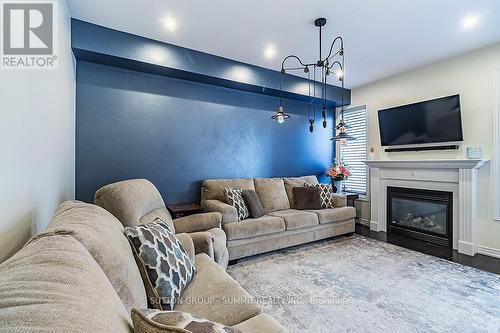 31 Mcdonald Crescent, Clarington, ON - Indoor Photo Showing Living Room With Fireplace