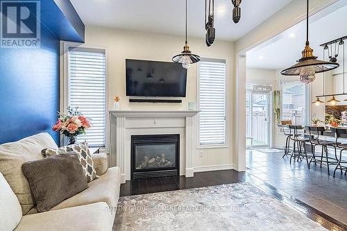 31 Mcdonald Crescent, Clarington, ON - Indoor Photo Showing Living Room With Fireplace