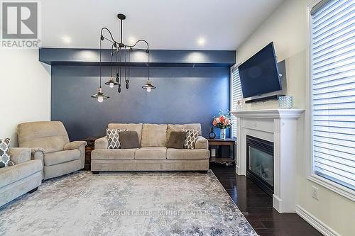 31 Mcdonald Crescent, Clarington, ON - Indoor Photo Showing Living Room With Fireplace