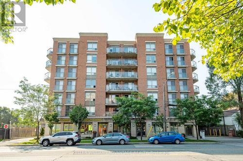 512 - 801 Sheppard Avenue W, Toronto, ON - Outdoor With Balcony With Facade