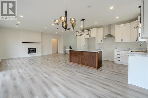 2 Heidi Crescent, Conception Bay South, NL - Indoor Photo Showing Kitchen With Fireplace