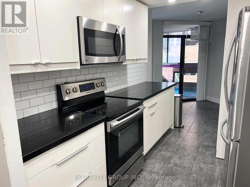 301 - 55 Wellesley Street E, Toronto, ON - Indoor Photo Showing Kitchen With Upgraded Kitchen