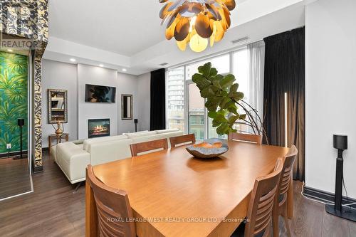 S426 - 112 George Street, Toronto, ON - Indoor Photo Showing Dining Room With Fireplace