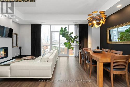 S426 - 112 George Street, Toronto, ON - Indoor Photo Showing Dining Room With Fireplace