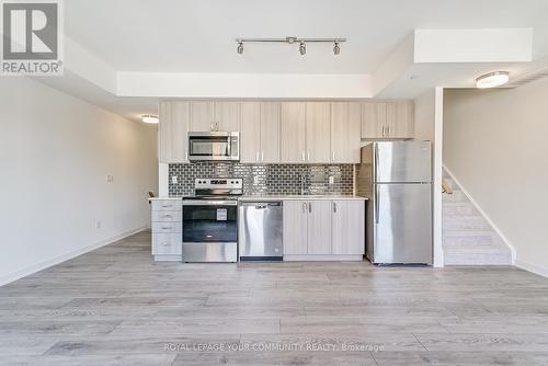 Th 28 - 4005 Hickory Drive, Mississauga, ON - Indoor Photo Showing Kitchen With Stainless Steel Kitchen