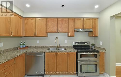 99 - 5030 Heatherleigh Avenue, Mississauga, ON - Indoor Photo Showing Kitchen With Double Sink