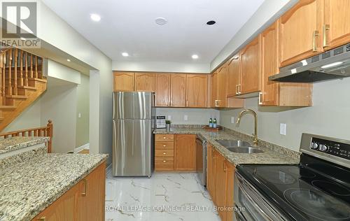 99 - 5030 Heatherleigh Avenue, Mississauga, ON - Indoor Photo Showing Kitchen With Stainless Steel Kitchen With Double Sink