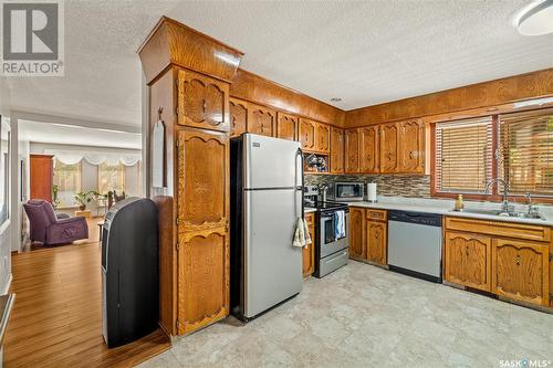 2479 Swayze Crescent, Regina, SK - Indoor Photo Showing Kitchen With Double Sink