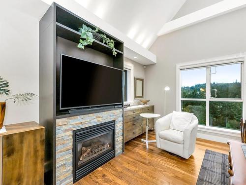 802-1400 Lynburne Pl, Langford, BC - Indoor Photo Showing Living Room With Fireplace