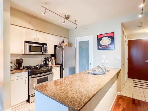 902-160 Wilson St, Victoria, BC - Indoor Photo Showing Kitchen With Double Sink