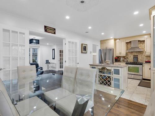 Dining room - 13 Rue Des Cyprès, Blainville, QC - Indoor Photo Showing Kitchen With Upgraded Kitchen