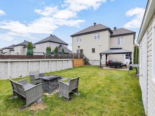 Backyard - 13 Rue Des Cyprès, Blainville, QC - Outdoor With Above Ground Pool With Backyard