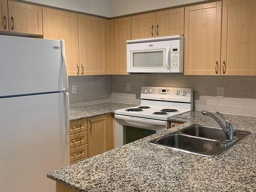 705-30 Clegg Rd, Markham, ON - Indoor Photo Showing Kitchen With Double Sink