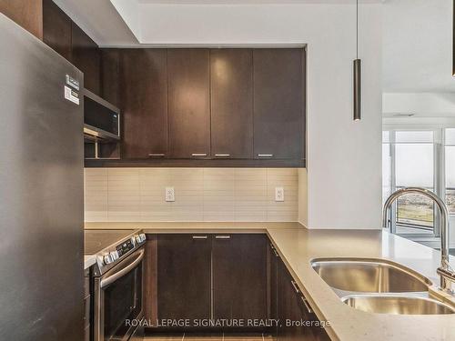 3411-385 Prince Of Wales Dr, Mississauga, ON - Indoor Photo Showing Kitchen With Double Sink