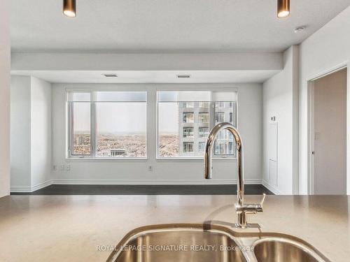 3411-385 Prince Of Wales Dr, Mississauga, ON - Indoor Photo Showing Kitchen With Double Sink