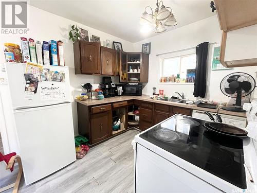 981 108Th Street, North Battleford, SK - Indoor Photo Showing Kitchen With Double Sink