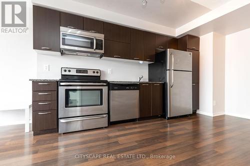 1027 - 38 Joe Shuster Way, Toronto, ON - Indoor Photo Showing Kitchen