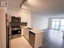 911 - 35 Watergarden Drive, Mississauga, ON  - Indoor Photo Showing Kitchen With Double Sink 