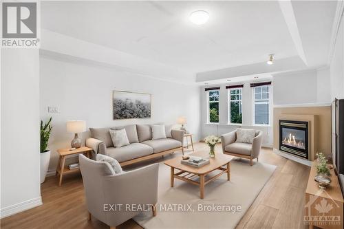 21 - 825 Grenon Avenue, Ottawa, ON - Indoor Photo Showing Living Room With Fireplace