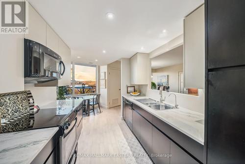 502 - 2 George Street N, Peterborough (Downtown), ON - Indoor Photo Showing Kitchen With Double Sink