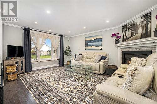 6477 Wheatfield Crescent, Ottawa, ON - Indoor Photo Showing Living Room With Fireplace