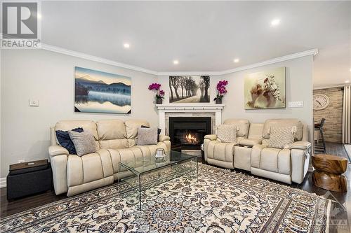 6477 Wheatfield Crescent, Ottawa, ON - Indoor Photo Showing Living Room With Fireplace