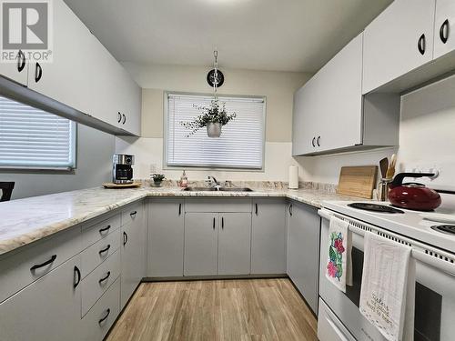 3020 5Th Avenue, Prince George, BC - Indoor Photo Showing Kitchen With Double Sink