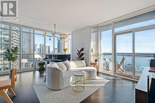 3206 - 15 Iceboat Terrace, Toronto, ON - Indoor Photo Showing Living Room With Body Of Water