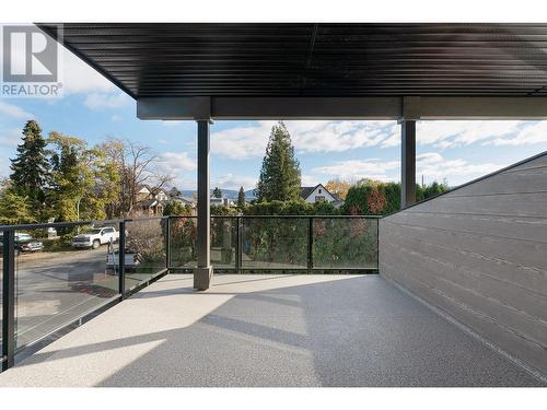 Private patio looking East - 727 Wardlaw Avenue Unit# 4, Kelowna, BC - Outdoor With Balcony