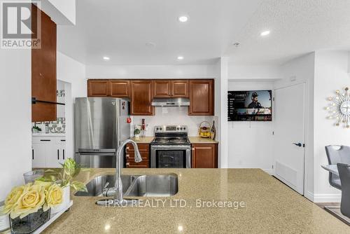 325 - 10 Mendelssohn Street, Toronto, ON - Indoor Photo Showing Kitchen With Double Sink