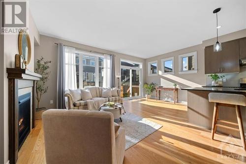 423 Warmstone Drive, Stittsville, ON - Indoor Photo Showing Living Room With Fireplace