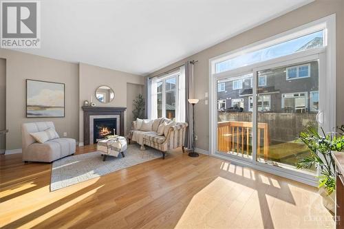 423 Warmstone Drive, Stittsville, ON - Indoor Photo Showing Living Room With Fireplace