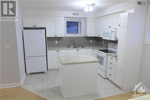 216 Carillon Street Unit#1, Ottawa, ON - Indoor Photo Showing Kitchen With Double Sink